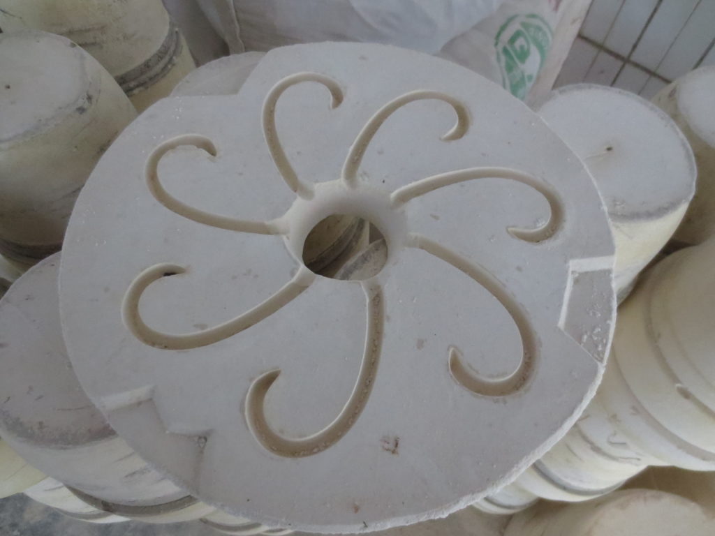 A centrifugal casting mold for making mug handles